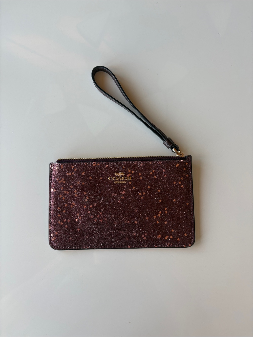 Coach Glitter Wristlet in Bordeaux with Gold Logo